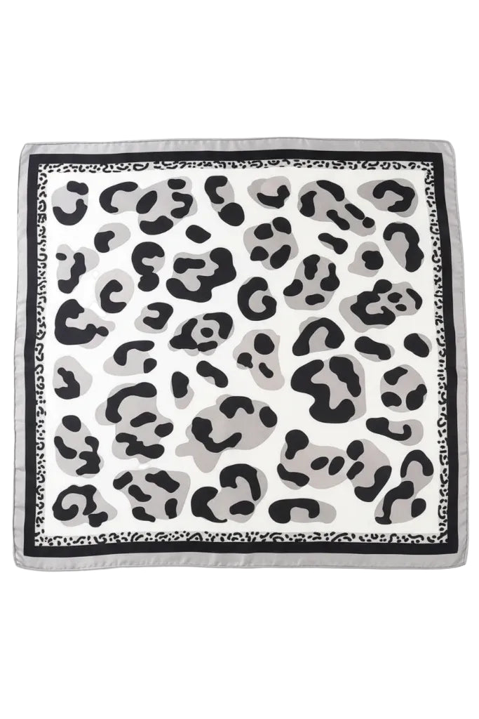 black and white leopard print silky scarf on white background